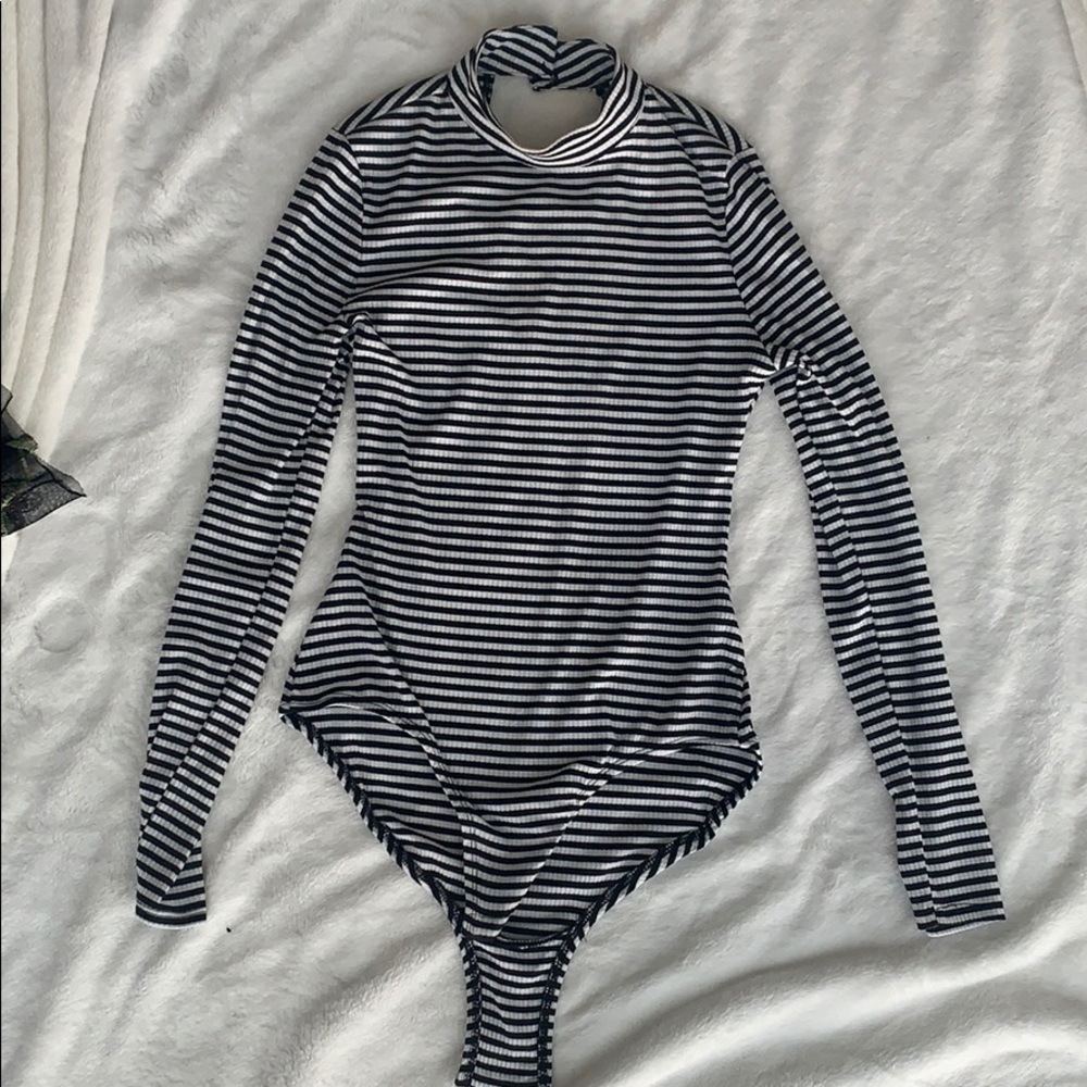 Black and white striped onesie